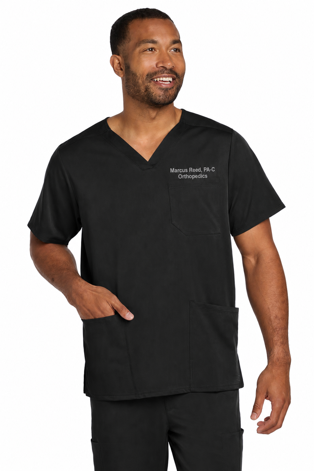 Wink WW5068 black scrub top with sample Marcus Reed embroidery